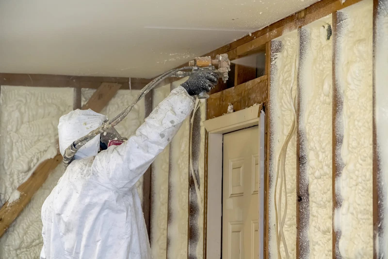 Mission Insulation technician applying spray foam insulation